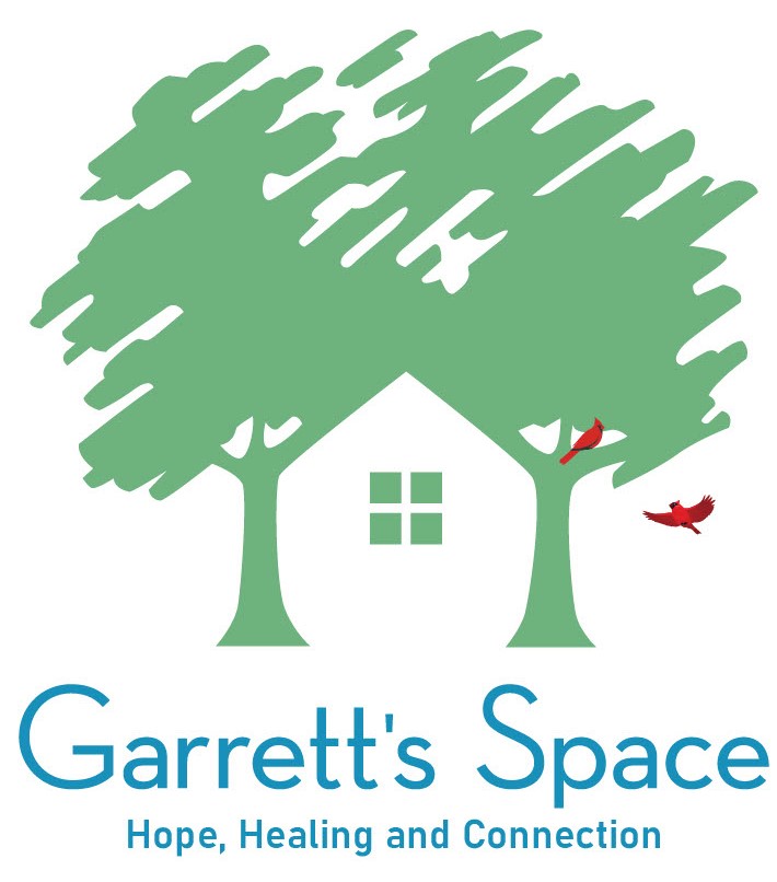 Logo that with two green trees and house in the middle with two red birds. It says Garett's Space, Hope, Healing, and Connection.